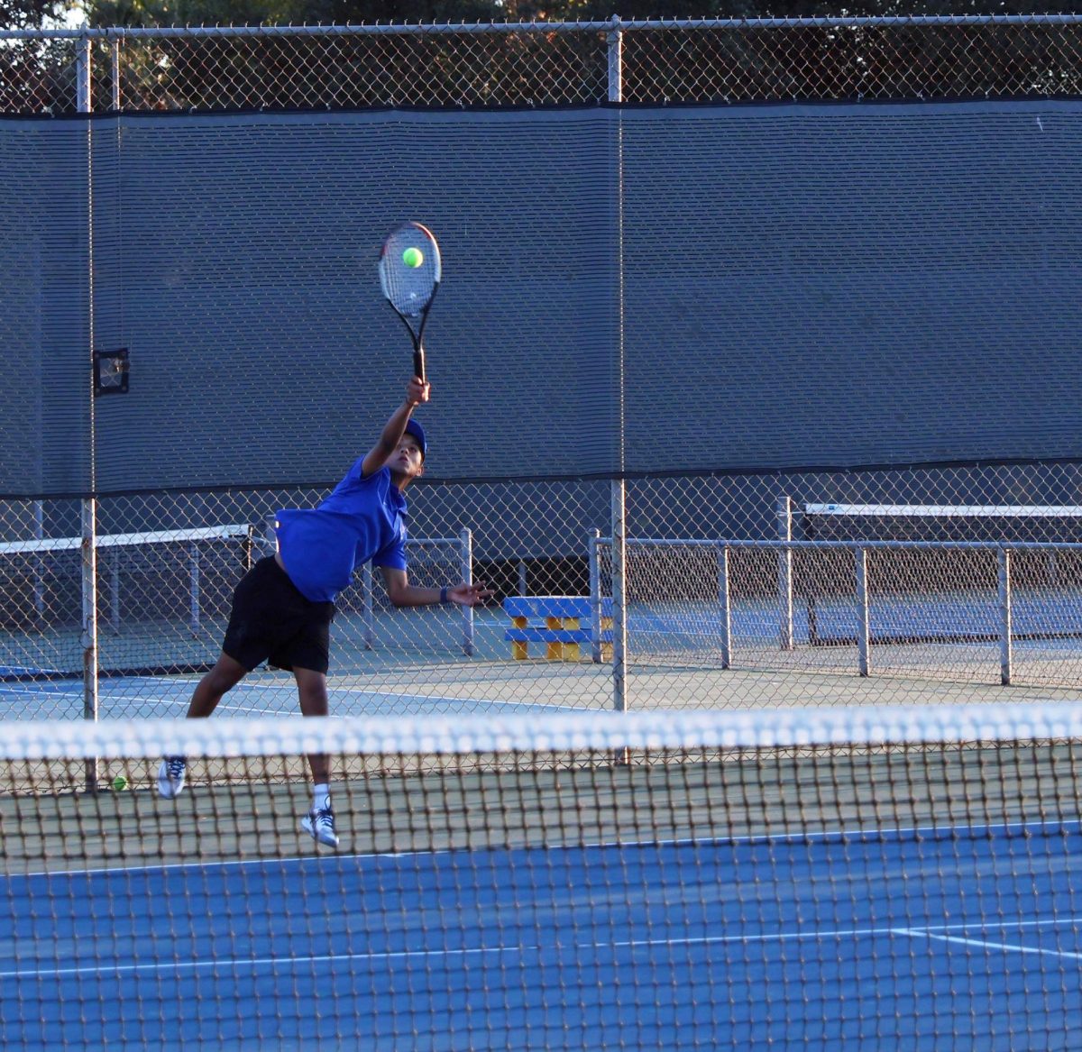 Big Swing. Facing off against San Pasqual, boys tennis serves strong. 