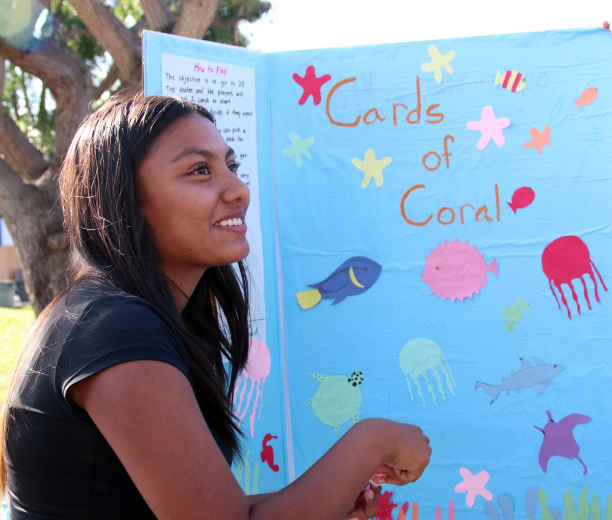 Listen carefully!
Leah Barrientos, 9, explains the rules of her group's math night game to students. This math night had much more than just presenting because students got to play and beat each other's games. “It was really fun seeing other peoples games and their designs, everyone put in a lot of work into math night,” Barrientos said. While math was still an important part, winning prizes played a big role in math night this time. 
