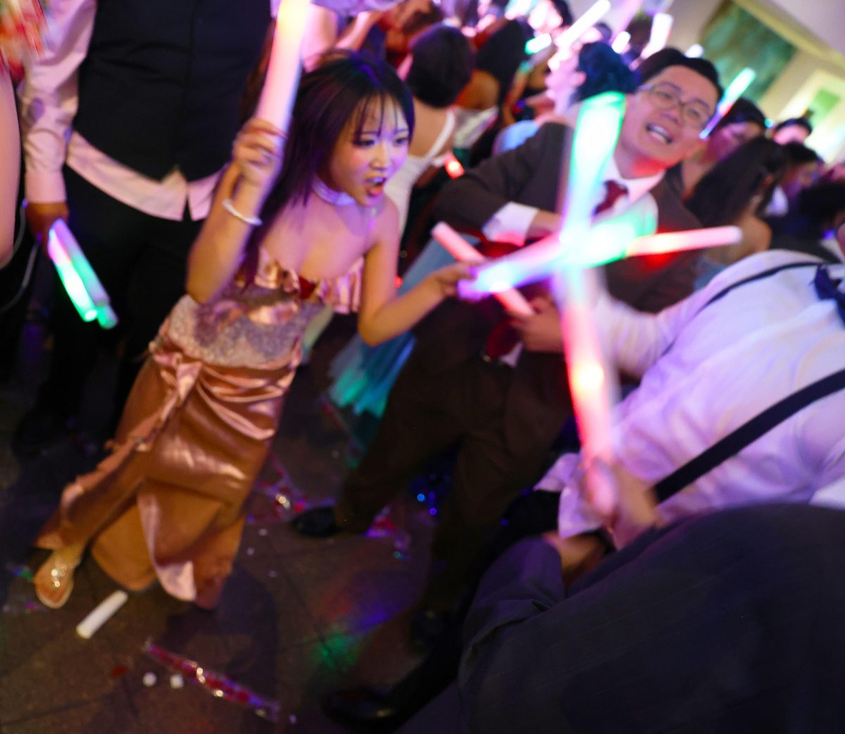 Students dance during Prom. 