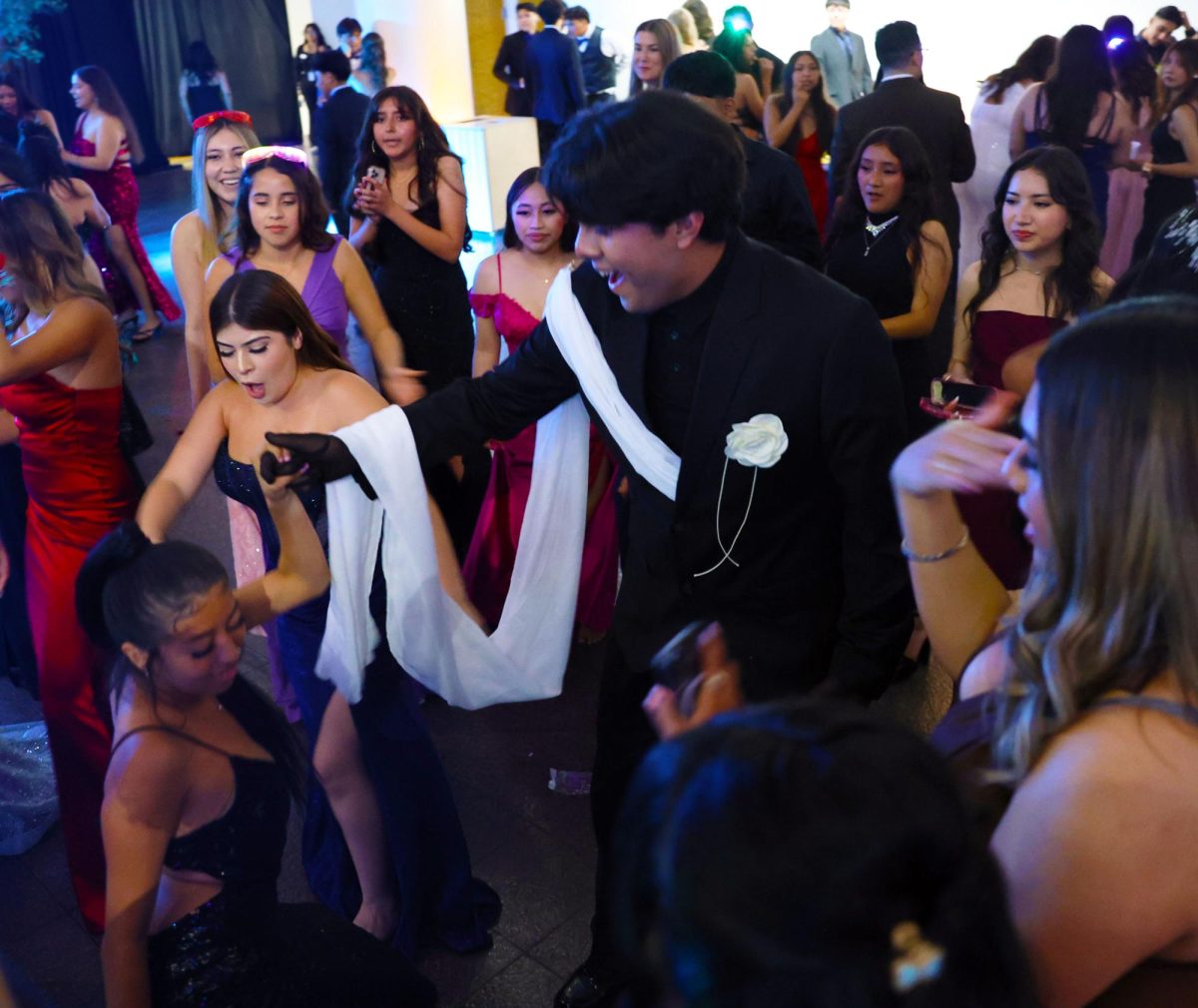Students dance together during Prom. 