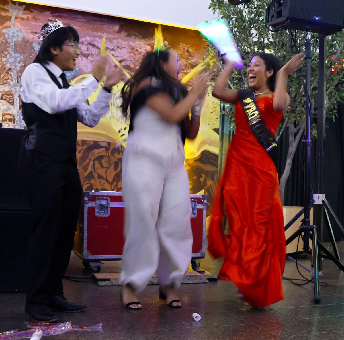 Abril Colin and Lezly Bahena celebrate Colin's crowning as Prom Queen. 