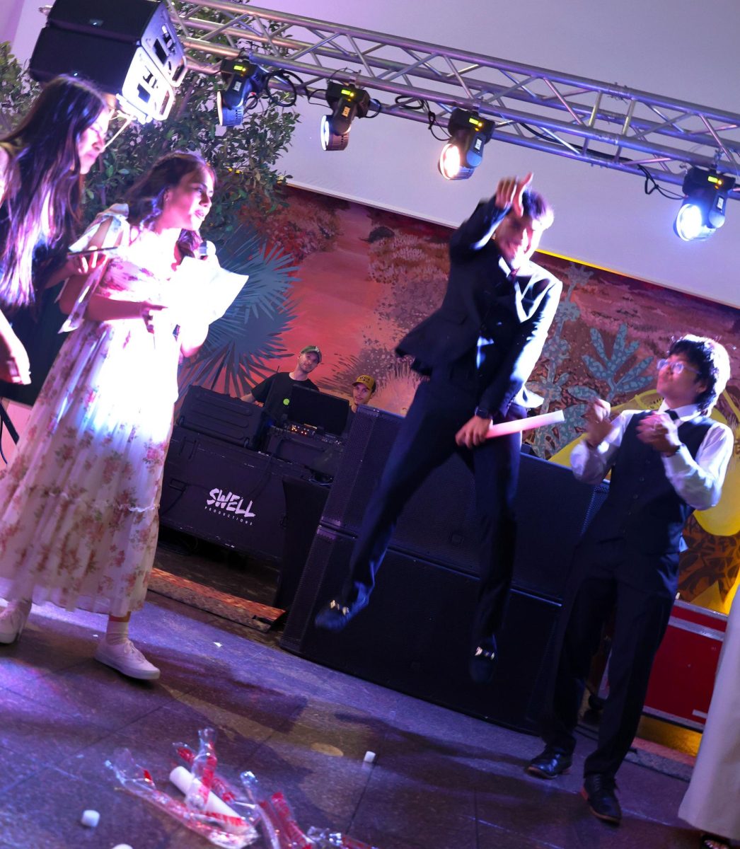 Prom King Samuel Aguilar celebrates his victory. 