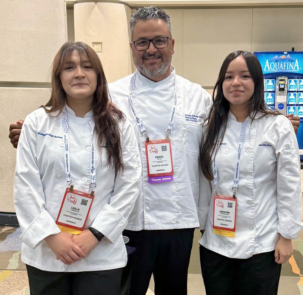 Chef Micheal Reyes, Leslie Carrillo, 11, and Jennifer Ortiz, 12, in uniform ready to compete. Photo provided by Micheal Reyes